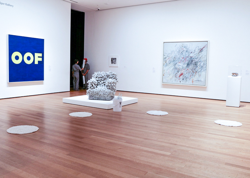 Photo documentation of Kusama's Accumulation No. 1 with performance setup at MoMA